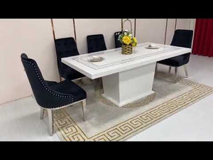 Elegant and Classy Marble Dining Table With Modern Black Leather Dining Room Chairs with Silver Stainless Steel Frame