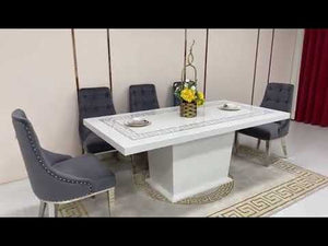 Classy Marble Dining Table With Modern Grey Velvet Dining Room Chairs in Silver Stainless Steel Frame