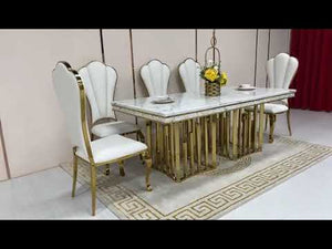 Elegant and Classy Marble Dining Table With White Leather Style Dining Room Chairs in Gold Stainless Steel Frame