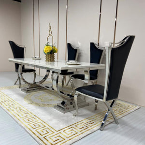 Classic Marble Dining Table With Black Leather Classy Dining Room Chairs in Silver Stainless Steel Frame