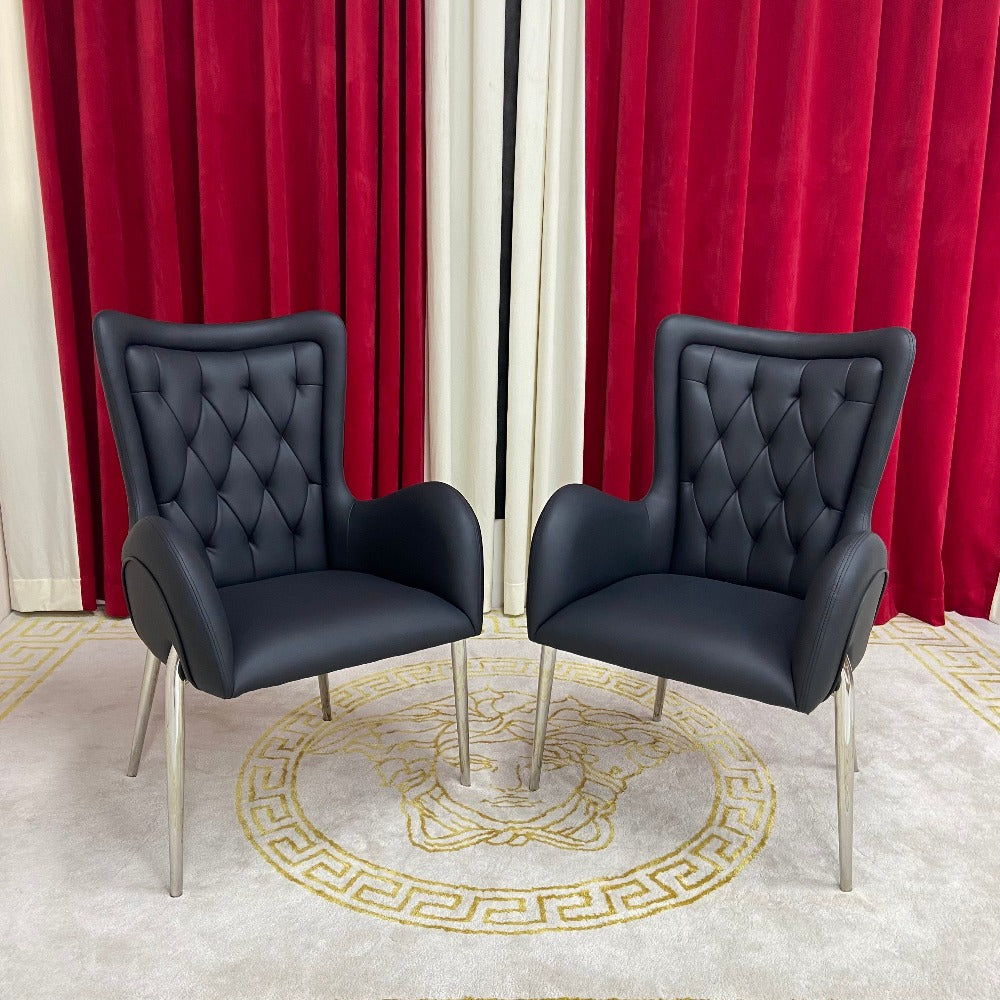 Classy Marble Dining Table With Black Leather Style Dining Room Chairs in Silver Stainless Steel Frame