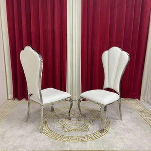 Classy Marble Dining Table With Nelly White Leather Silver Dining Room Chairs in Silver Stainless Steel Frame